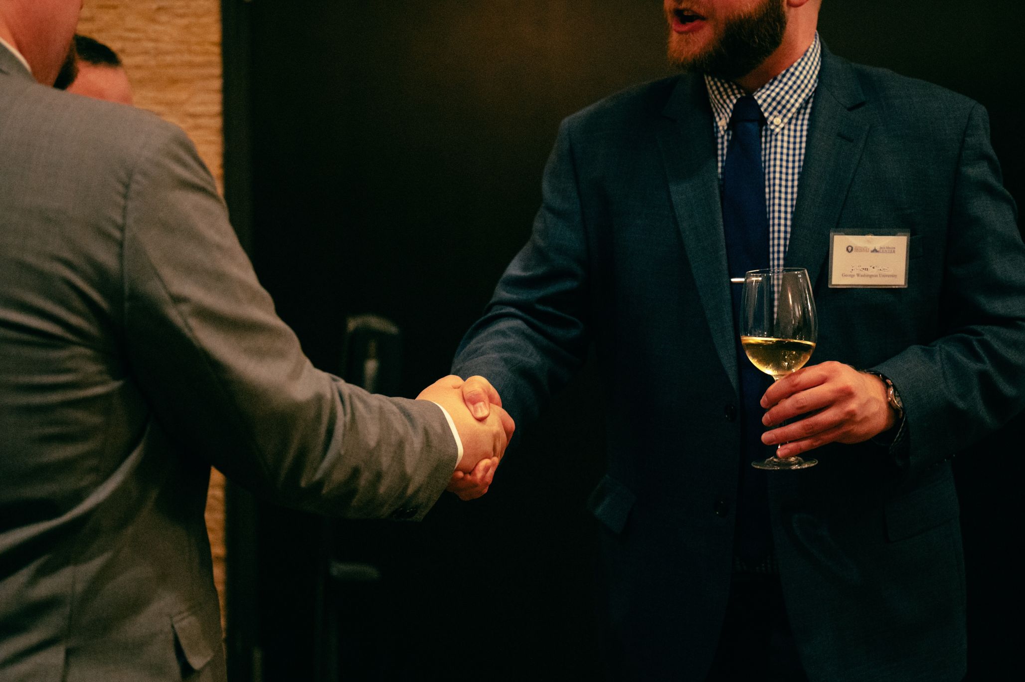 Scholars shaking hands