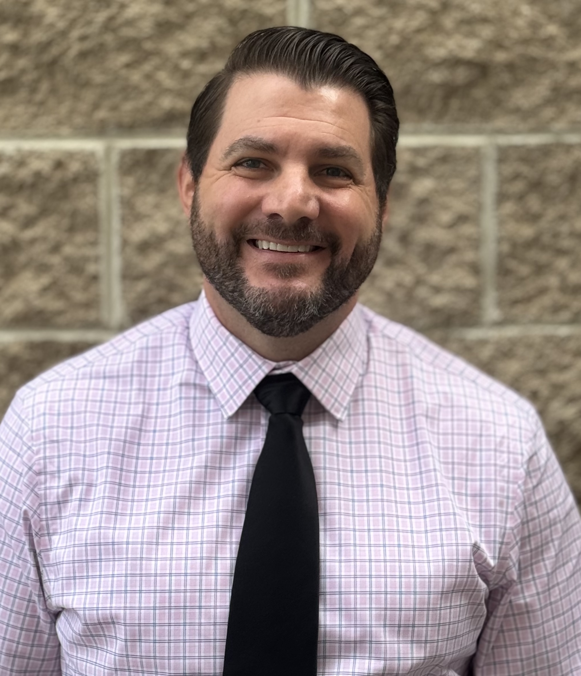 Headshot photo of Justin Emrich